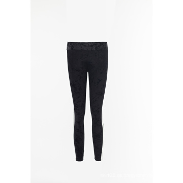 Leggings de terciopelo macizo para mujer.